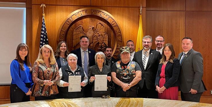 Governor smiling supporting New Mexico veterans